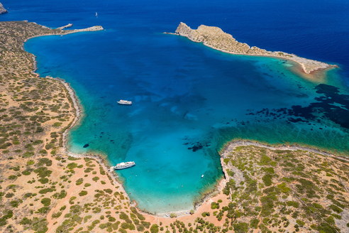 Aerial,View,Of,An,Island,Surrounded,By,Beautiful,,Clear,Blue